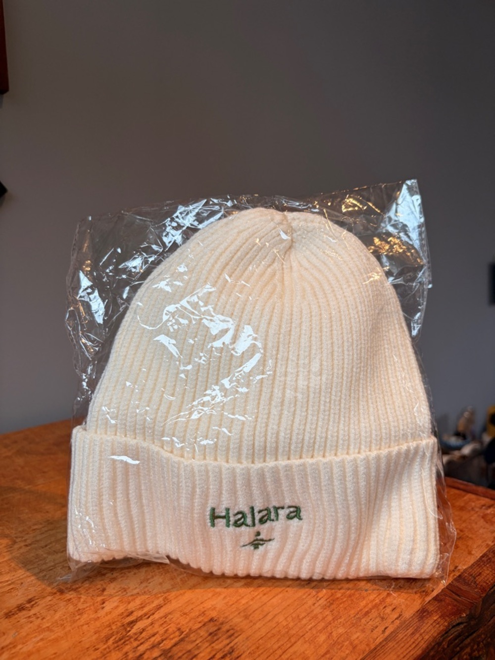 HALARA Cream Ribbed Fold-Over Beanie with Green Logo